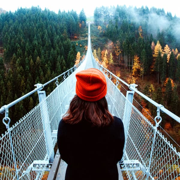 Blog-Post-Money_o Woman on suspension bridge